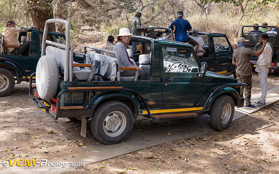 Suzuki Gypsy vehicles waiting to enter the park.